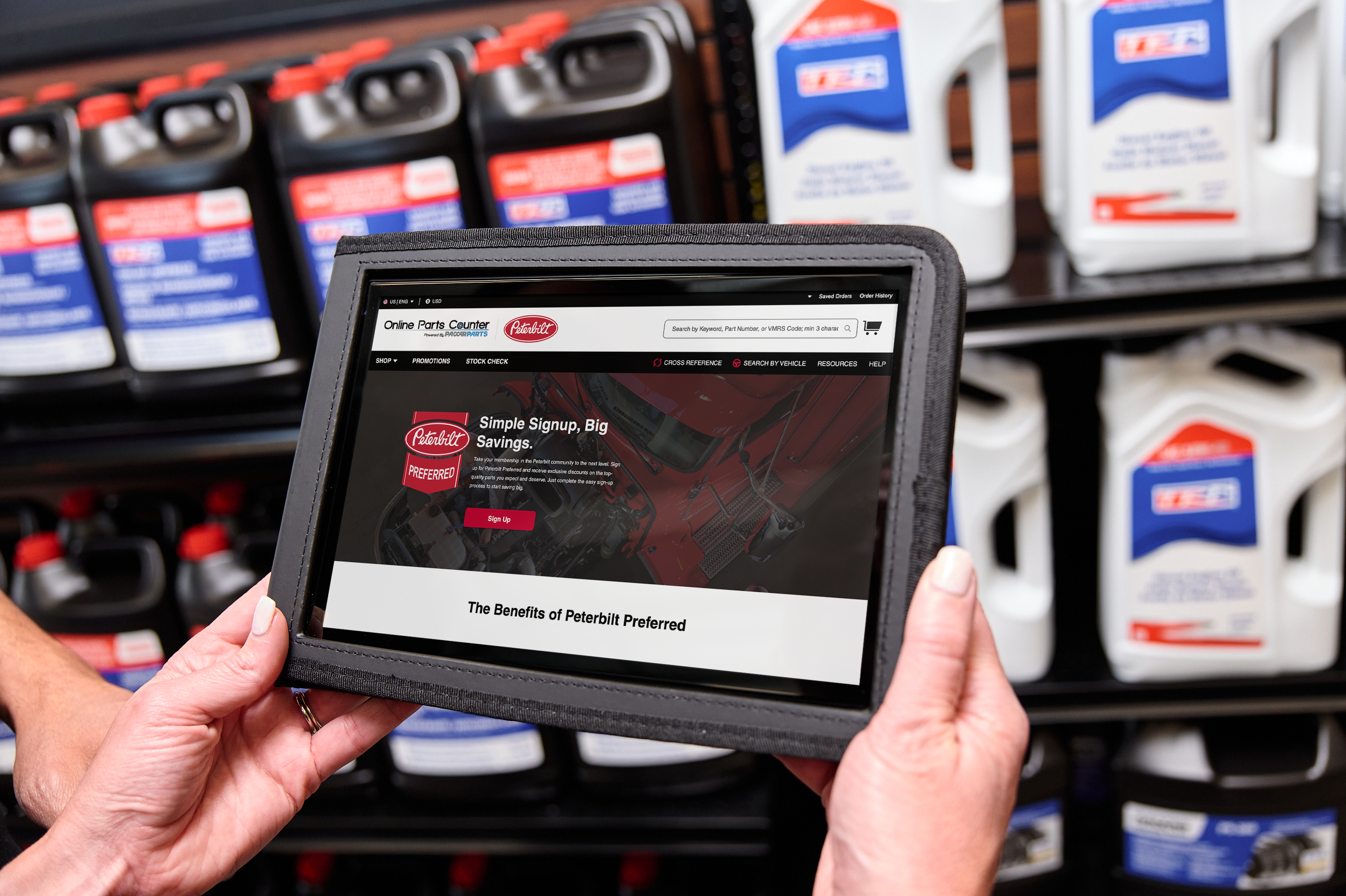 Person navigating Online Parts Counter using tablet.